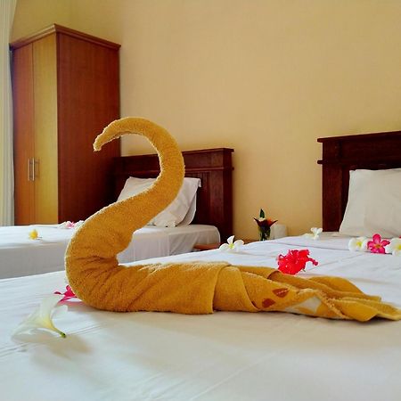 Asih Homestay เปมูเตรัน ภายนอก รูปภาพ