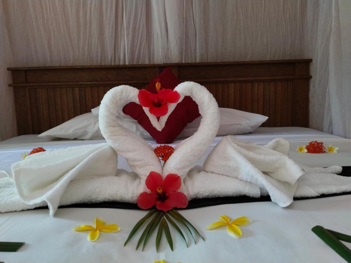 Asih Homestay เปมูเตรัน ภายนอก รูปภาพ