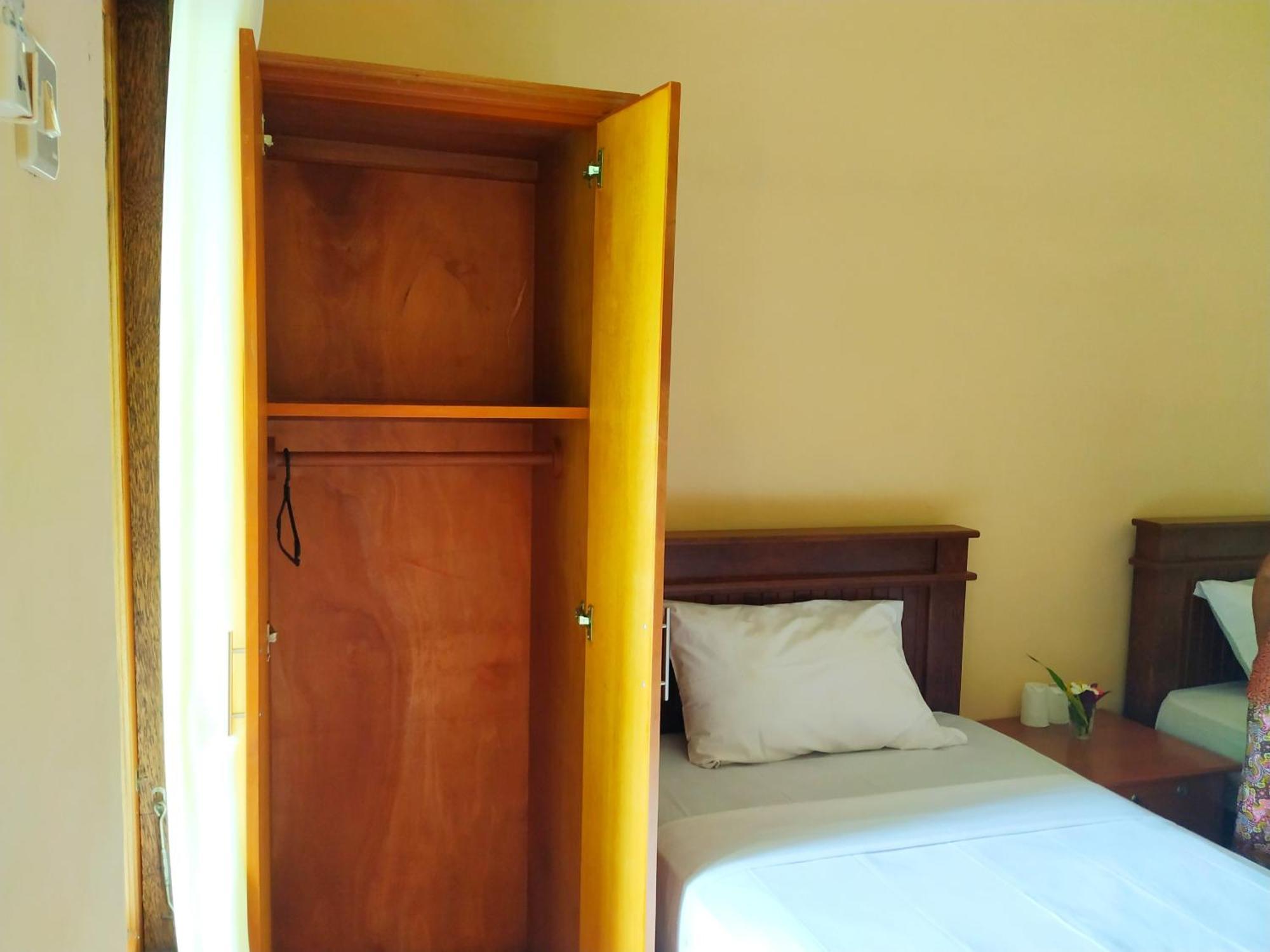Asih Homestay เปมูเตรัน ภายนอก รูปภาพ