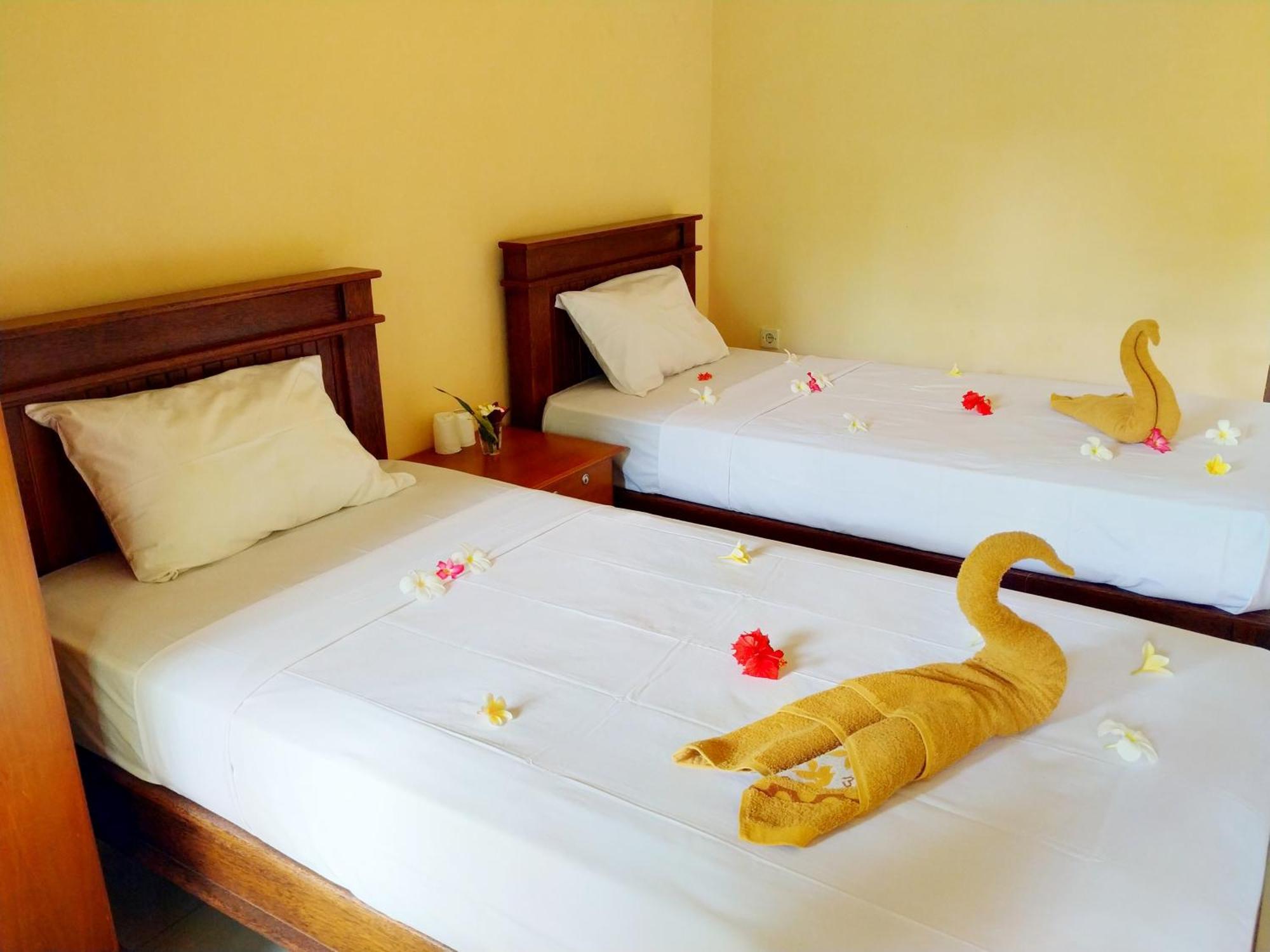 Asih Homestay เปมูเตรัน ภายนอก รูปภาพ