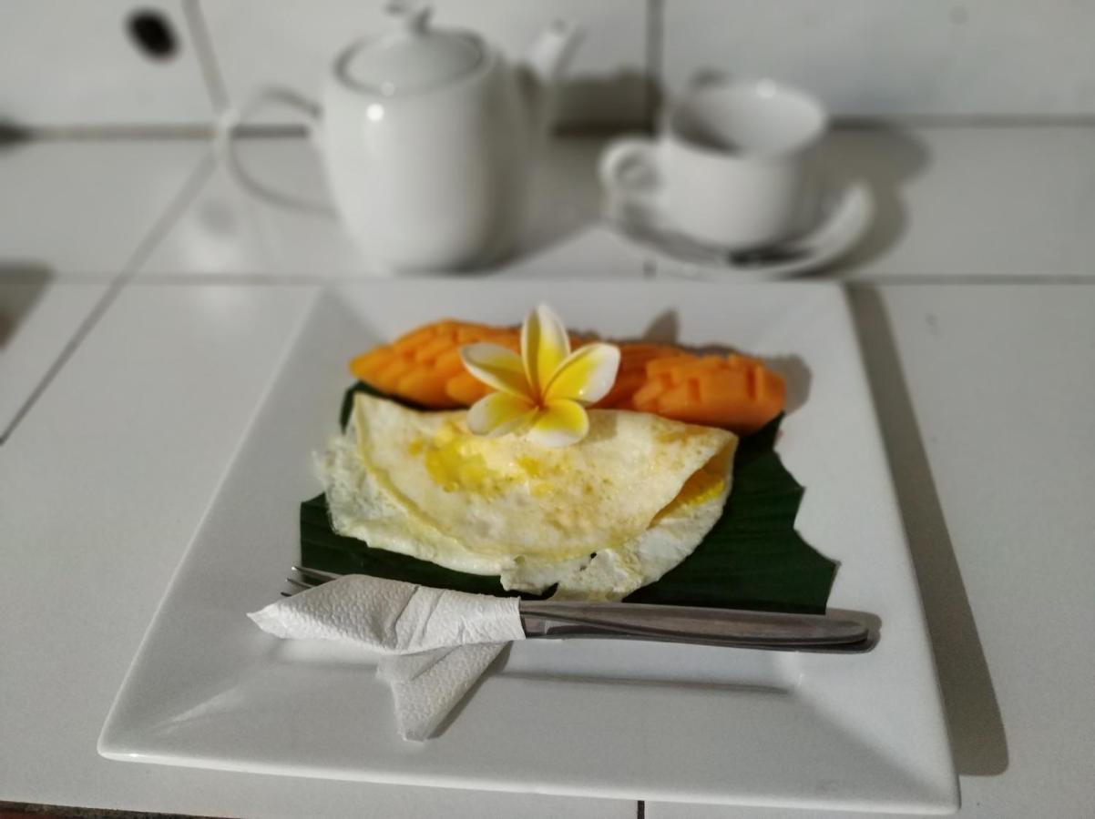 Asih Homestay เปมูเตรัน ภายนอก รูปภาพ